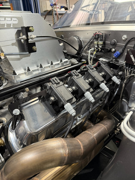 small block ford smart coil mounts installed on an engine